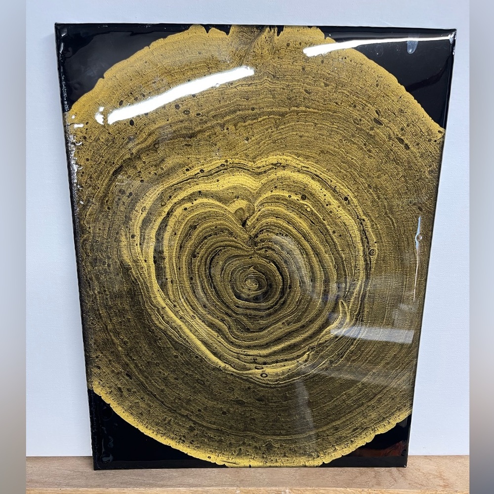 Golden Circular Tree Trunk Art